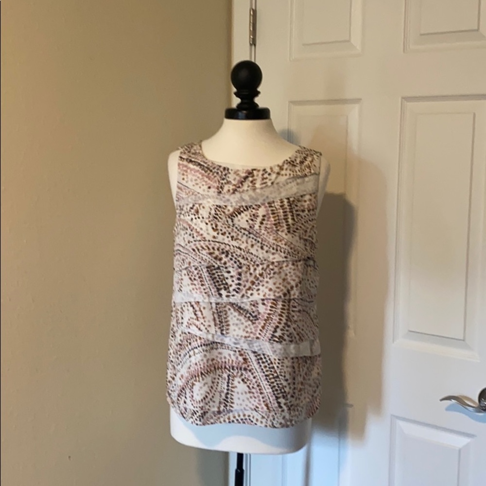 Business causal sleeveless blouse.